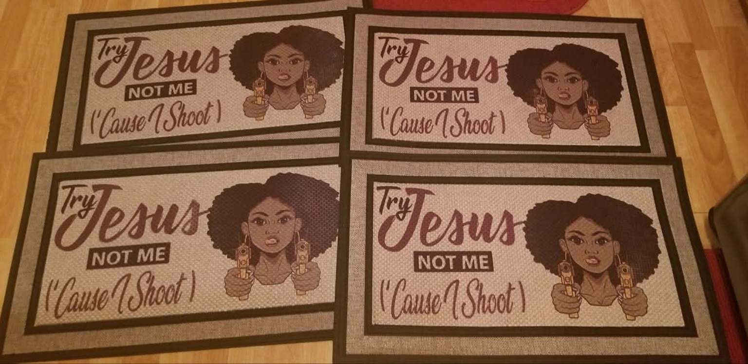 Four custom door mats with illustrated artwork and lettering